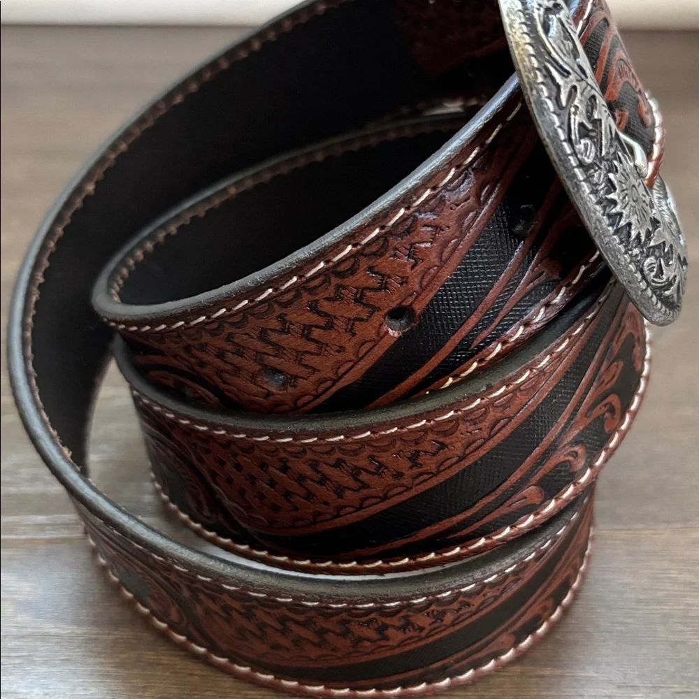 Ridge Mountain Genuine tooled leather,single stitch, silvertone embossed buckle
